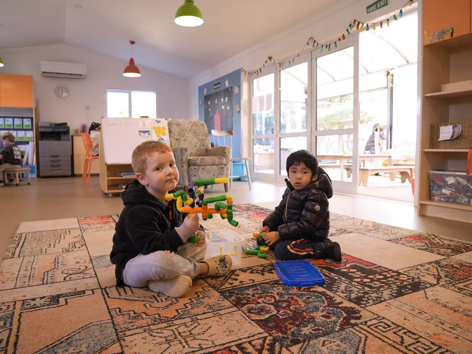 ellerslie village boys playing mat learning