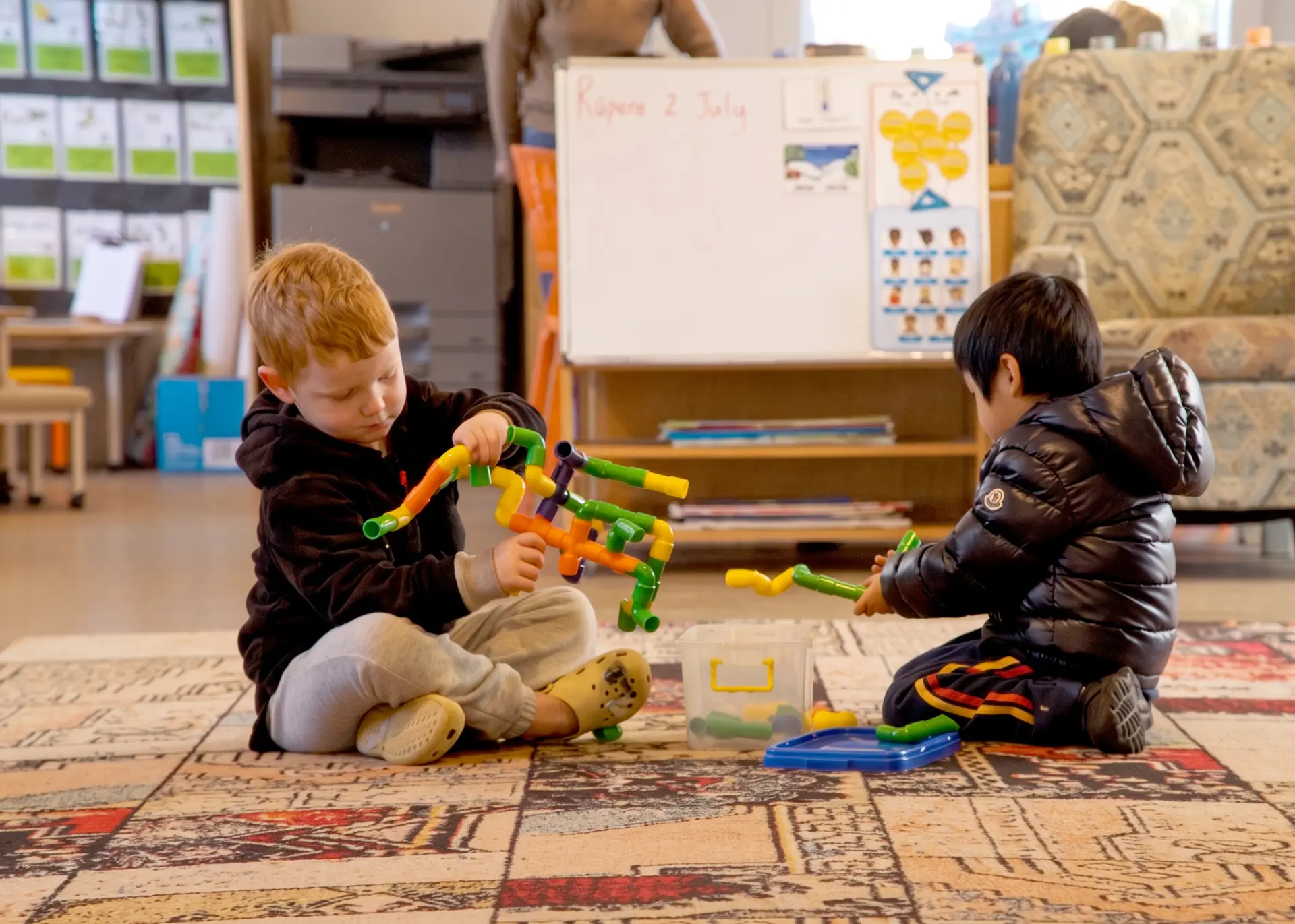 ellerslie two boys playing with toy pipes