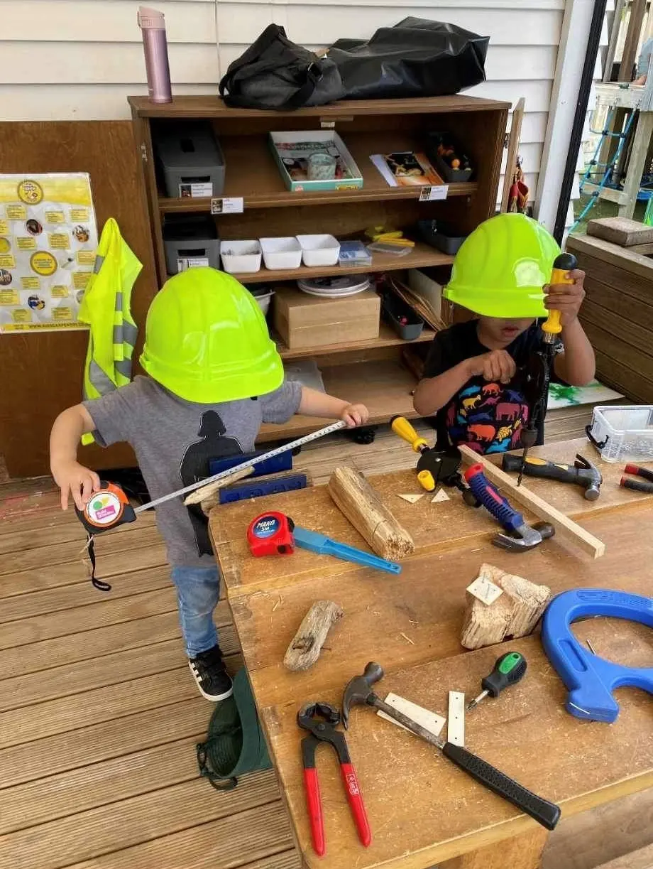 Ellerslie boys playing with tools