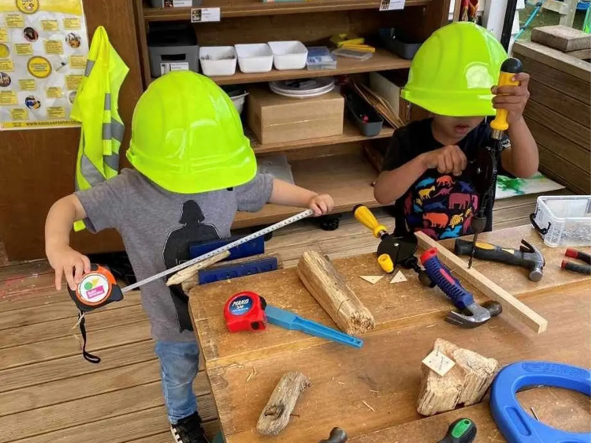 Ellerslie kids playing with tools