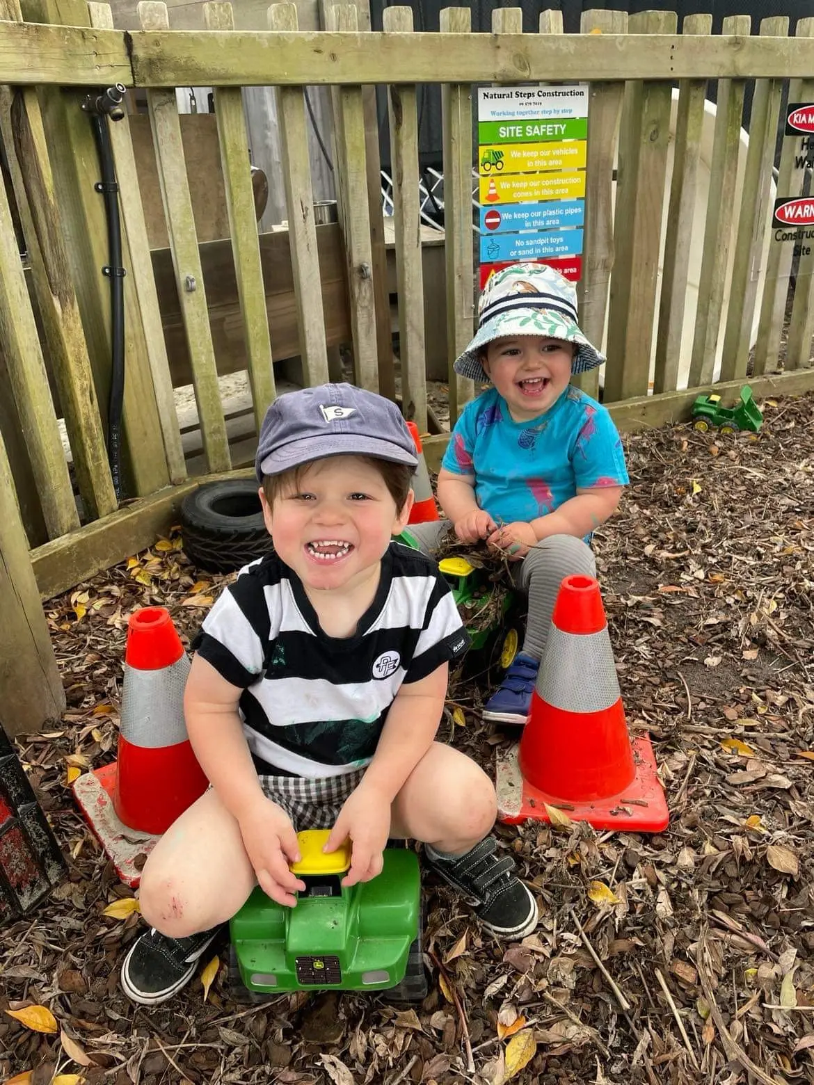 boys riding on truck toys at Piccolo room