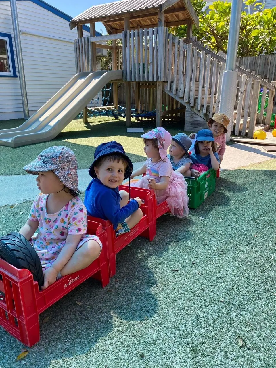 kids playing train with milk trays at Ellerslie centre